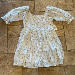 Size 14/16 white floral dress from Arula.